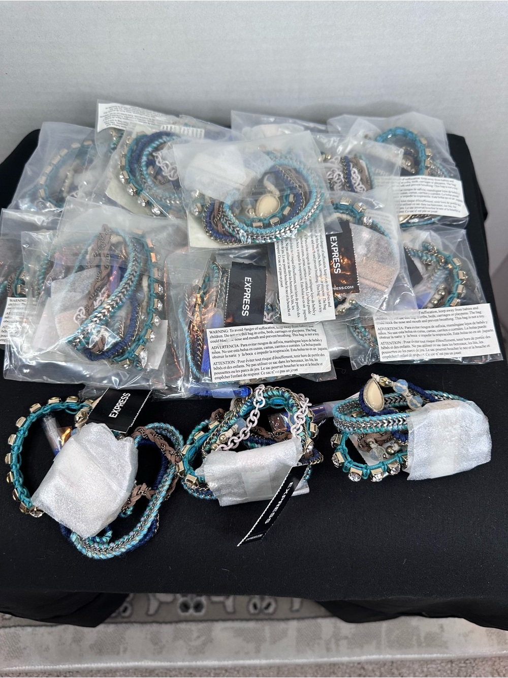 (20) Express multi strand rope bracelets, magnetic closure, mostly new